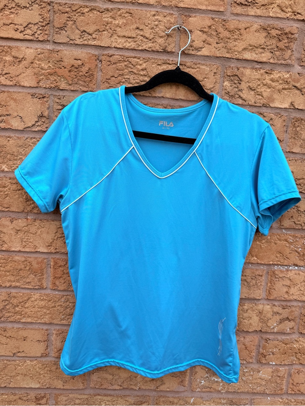 4/$25 • Fila Women’s Blue V-Neck Active Tee